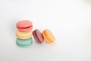 Colorful macarons cakes. Small French cakes.