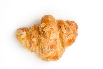 Fresh baked croissant on white background.