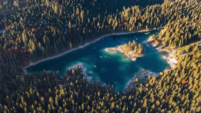 Aerial footage from the beautiful Lake Cauma surrounded by the mountains, located in Flims, Switzerland. Filmed during the sunrise with the DJI Inspire 2 drone in 5.2k RAW and downscaled to 4k.