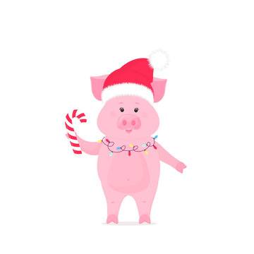 Pig in santa claus hat and christmas garland holding striped candy