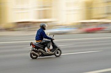 Obraz na płótnie Canvas A quick ride on a motorcycle.