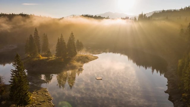Aerial footage from the beautiful Lake Cauma surrounded by the mountains, located in Flims, Switzerland. Filmed during the sunrise with the DJI Inspire 2 drone in 5.2k RAW and downscaled to 4k.