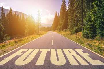 Future word written on road in the mountains