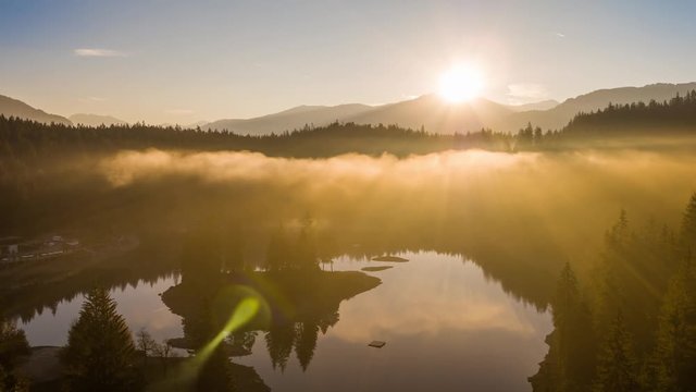 Aerial footage from the beautiful Lake Cauma surrounded by the mountains, located in Flims, Switzerland. Filmed during the sunrise with the DJI Inspire 2 drone in 5.2k RAW and downscaled to 4k.