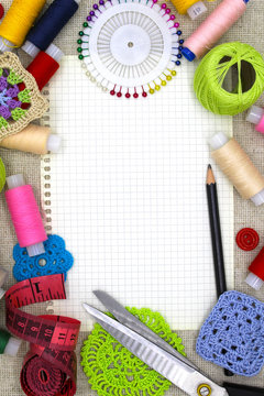 Materials and tools for needlework. Concept of handmade hobby. Bright accessories. Free space for your text.