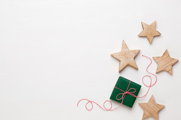 Christmas composition. Wooden decorations, stars on white background. Christmas, winter, new year...
