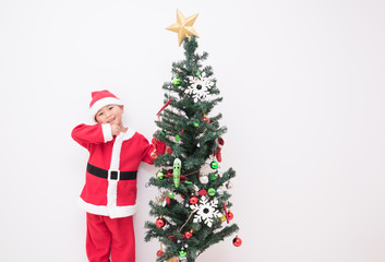 Fototapeta premium サンタの服を着る男の子