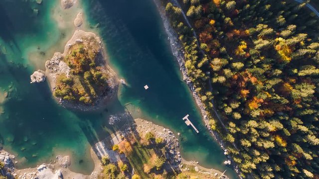 Aerial footage from the beautiful Lake Cauma surrounded by the mountains, located in Flims, Switzerland. Filmed during the sunrise with the DJI Inspire 2 drone in 5.2k RAW and downscaled to 4k.
