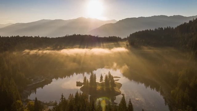 Aerial footage from the beautiful Lake Cauma surrounded by the mountains, located in Flims, Switzerland. Filmed during the sunrise with the DJI Inspire 2 drone in 5.2k RAW and downscaled to 4k.
