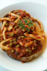 Seppia in umido con piselli