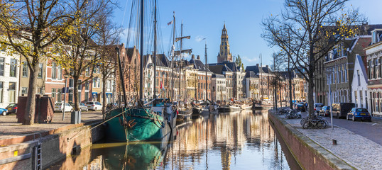 Panorama of historic ships and warehouses in the center of Groningen, The Netherlands - obrazy, fototapety, plakaty