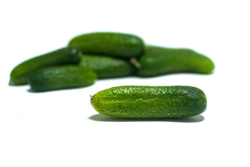 Fresh , green cucumbers isolated on white background