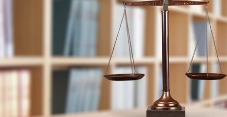 Law scales on table, close-up view