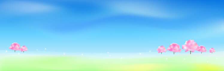 Obraz premium 桜の木が立ち並ぶ草原 うららかな春霞の青い空