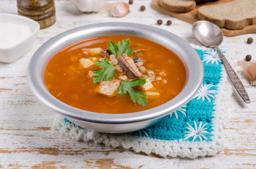 Traditional tomato fish soup
