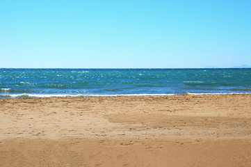 Fototapeta na wymiar Uninhabited beach, sea view with wave, sand and sky