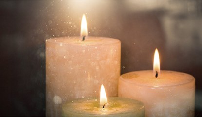 Golden light of candle flame.