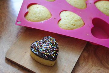 Delicious heart-shaped muffins with powder