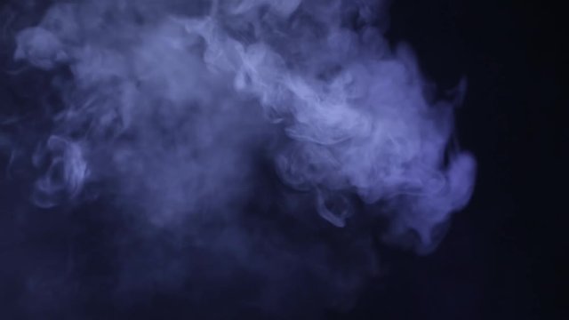 Smoke vape vapor video for designers works - abstract video texture of the real smoke on the black background.