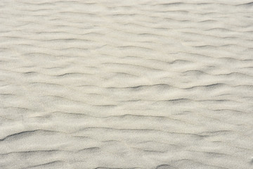 Obraz premium Sanformen auf der Küste. Wellen