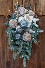 christmas wreath on wooden door