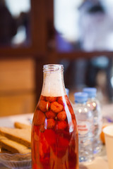 Strawberry lemonade in a glass bottle
