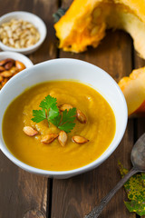 pumpkin soup on wooden surface