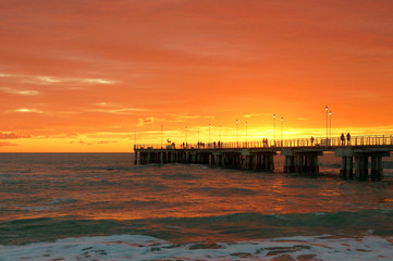 jetty in a red sunset