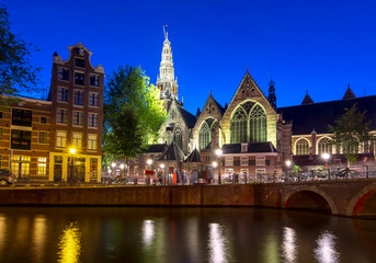 Old Church (Oude Kerk) and Amsterdam canals at night, Netherlands