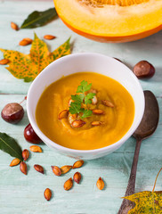 pumpkin soup on wooden surface