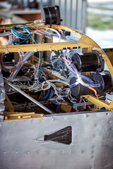 The interior of the instrument panel of a light single-engine aircraft without coating.