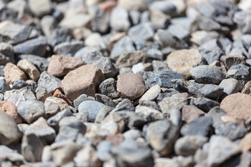 Gravel construction worker as abstract background