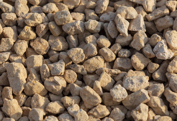 White gravel on a construction site as an abstract background