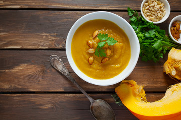 pumpkin soup on wooden surface