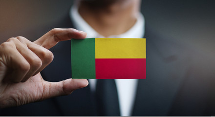 Businessman Holding Card of Benin Flag