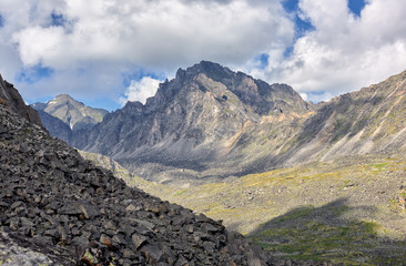 Collapsing peak under influence of weathering erosion