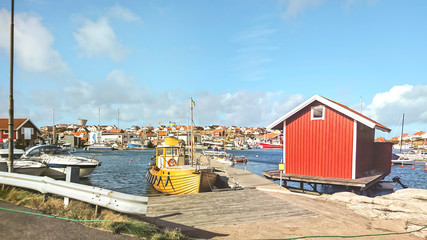 Boats in the harbor by a small fishing village on the shores of the North Sea, Sweden.