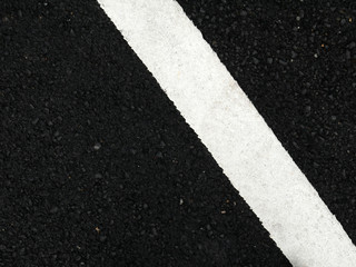 Fototapeta premium Black paved road background.