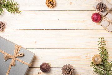 Christmas composition. Christmas gift. christmas ball. pine cones. fir branches on wooden white background.top view. copy space