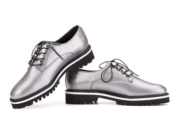 Shoes in silver-metallic color.