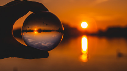 Crystal ball sunset shot near Plattling-Isar-Bavaria-Germany