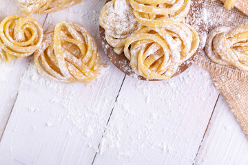 pasta with pasta ingredients on the dark wooden table top view