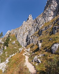 Panoramic view of the towers and spiers of the southern Grigna from the direct route, on a sunny autumn day.