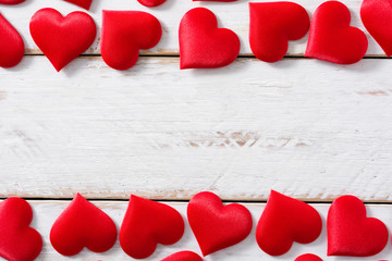 Red hearts pattern on white background. Top view. Copyspace
