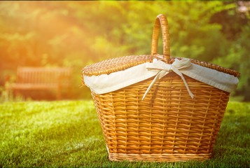 Picnic Basket with napkin on nature background