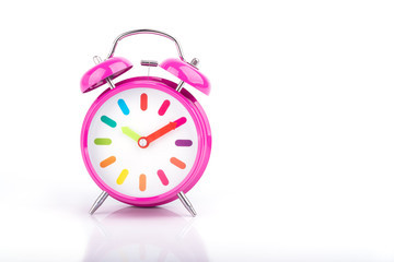 Pink retro Alarm clock isolated on white background
