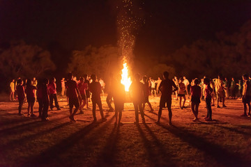 Night campfire in middle