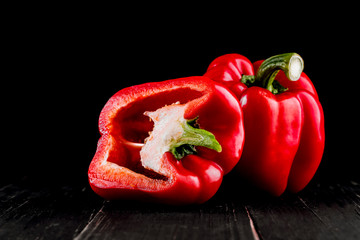 Three sweet peppers on a wooden background, Cooking vegetable salad