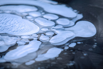 ice backaground, natural ice texture with frozen air bubbles