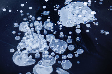 ice backaground, natural ice texture with frozen air bubbles